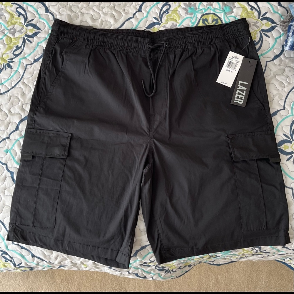 Men black elastic waistband shirts.  XL new with tags.